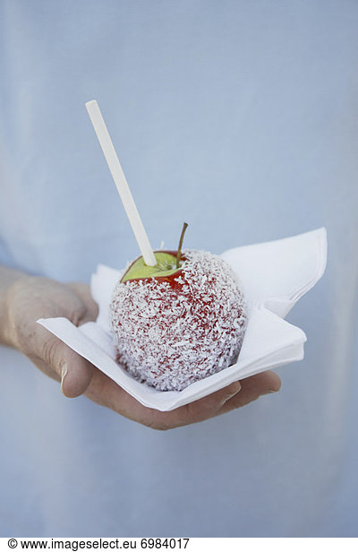 Person Holding Candy Apple