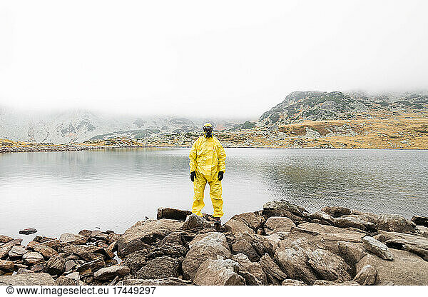 Person wearing yellow hazmat suit during Covid 19 pandemic
