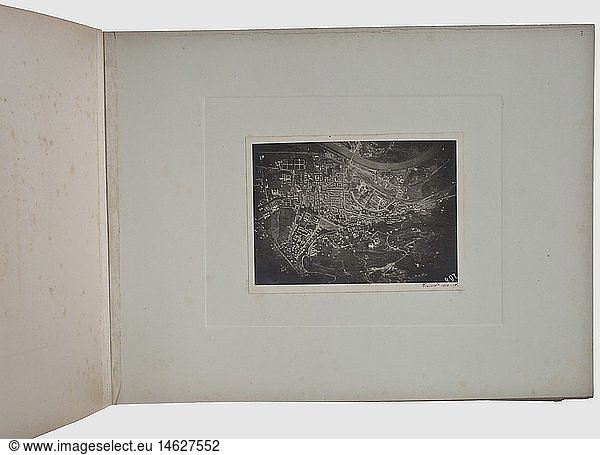Photo album of the Italian Air Forces  First World War  1916/1917 Large-size photo album with 63 aerial shots in various formats for bombardments by the Italian Air Forces (Corpo Aeronautico Militare) or for other purposes  a whole series with the abbreviation 'RSB' in a circle  among them: the port facilities of Trieste in September 1918  Trento  Istria 28 July and 7 August 1917  Chiapovano 5 and 11 August 1917  Assling railway station  Dottoghiano 17 August 1917  Shavinie 19 August 1917  Baintizza 19 August 1917  Cesovhie 19 August 1917  Arnoldstein railway station 10 August 1917  Temiz 21 August 1917  Skerlina (Duino) 22 August 1917  Rovescio 23 August 1917  Panovizza 28 August 1917  Potok 27 September 1917  Podb historic  historical  1910s  20th century  troop  troops  armed forces  military  militaria  army  wing  group  air force  air forces  object  objects  stills  clipping  clippings  cut out  cut-out  cut-outs  book  books  literature