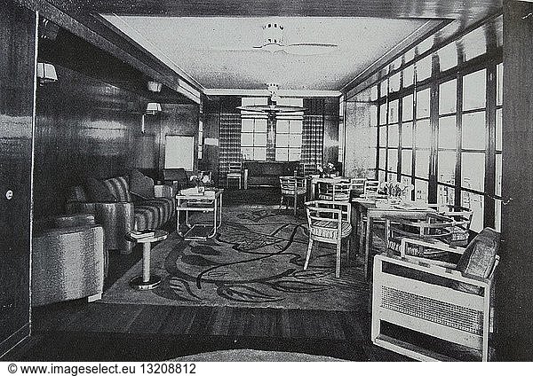 Photograph of the interior of the furnished veranda in the Orion  Orient Line Vessel on the British-Colombo-Australia run