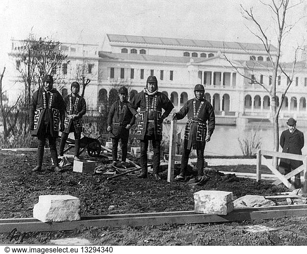 Photographic print of Japanese carpenters and stone masons in distinctive native attire starting to construct Japanese Pavilion at World Columbian Exposition  Chicago.