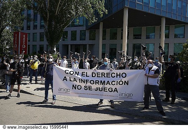 Photojournalists hold a banner that reads 'The Right to Information is not a Game' during a protest held at LaLiga headquarters in Madrid  Spain  28 May 2020  to denounce that the Spanish Professional Soccer League is preventing them from doing their job by banning them from training sessions and matches. LaLiga decided to ban photographers from matches and training sessions by providing media with handout photographs and video footage because of the coronavirus crisis..28 May 2020