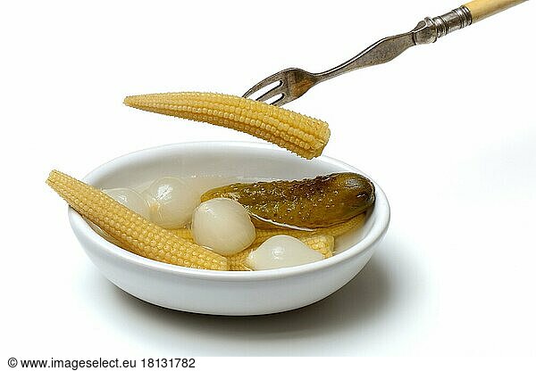 Pickled corn calves  silver onions and cucumber in shell  pickled gherkin  delicacy cucumber  pickled  piquant  spicy  spicy