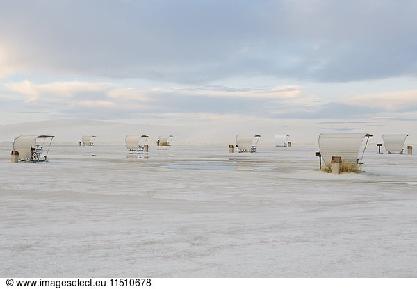 Picnic tables and shelters at White Sands National Park  dusk
