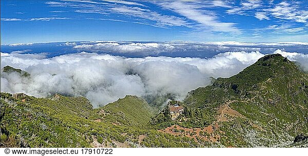 Pico Ruivo (1. 862 m) View from Madeira's highest peak  spectacular view  vegetation  above cloud cover  hiking holiday  panoramic view  summit climb  mountain hut below Pico Ruivo peak  lava rock  Madeira  Portugal  Europe