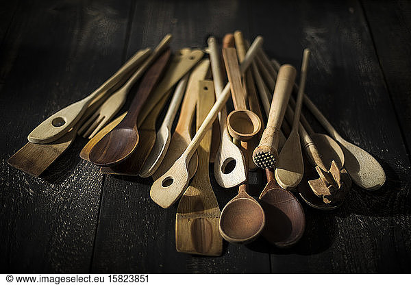 Pile of various wooden kitchen utensils