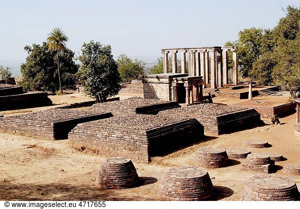 Pillars and foundation structure of Buddhist architectural forms near Mahastupa no 1 at Sanchi   Bhopal   Madhya Pradesh   India
