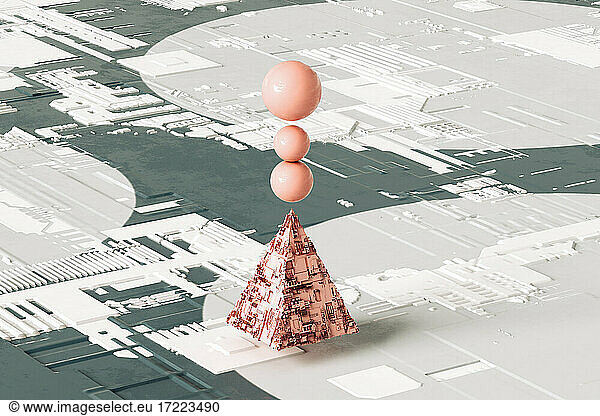 Pink abstract pyramid with three spheres balancing on top against futuristic background
