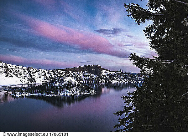 pink and purple sunrise winter over Crater Lake National Park  Oregon