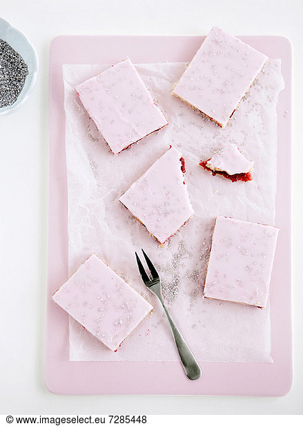 Pink desserts on tray