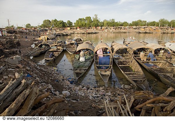 Pinnaces (traditional wooden boats) in the Port of Mopti  Mali. Some of them are the houses of fishermen's families of Bozo ethnic group.