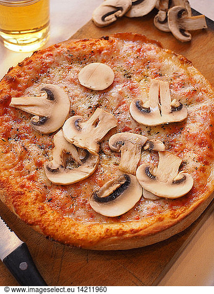 Pizza with tomato  mozzarella cheese and Champignon mushrooms