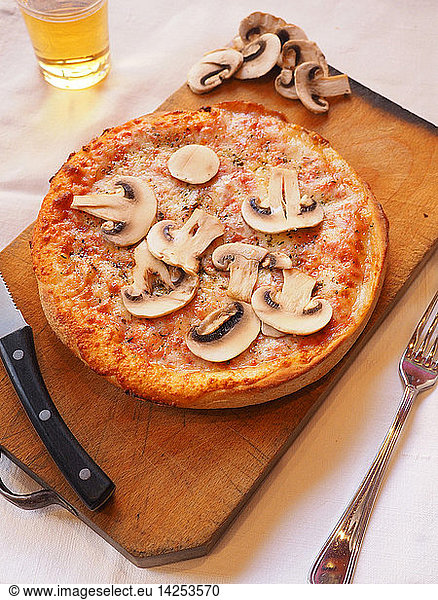 Pizza with tomato  mozzarella cheese and Champignon mushrooms