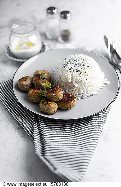 Plate of chicken meatballs with rice