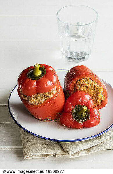 Plate of stuffed bell peppers with spelt