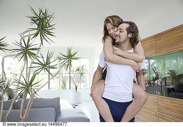 Playful Couple in Modern Living Room