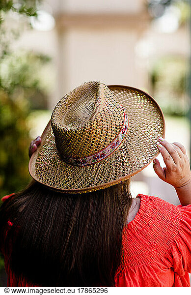 Plus Size Model Featuring the Back of Straw Hat in San Diego