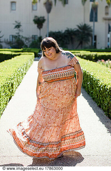 Plus Size Model Wearing Off the Shoulder Maxi Dress in San Diego