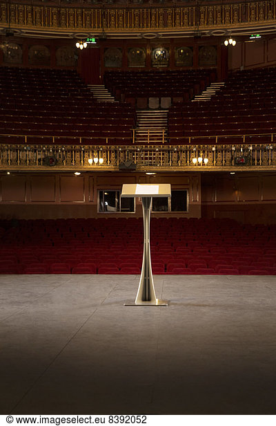 Podium on stage in empty theater