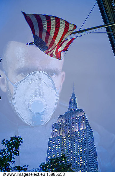 Policeman wearing face mask  watching over NYC  USA  multiple exposure
