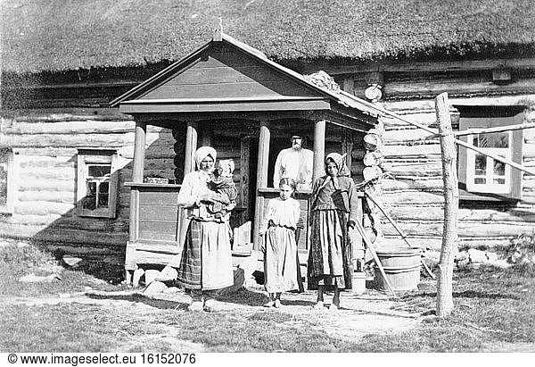 Polish farming family Polish farming family, wooden house, 1916.,CHILD ...