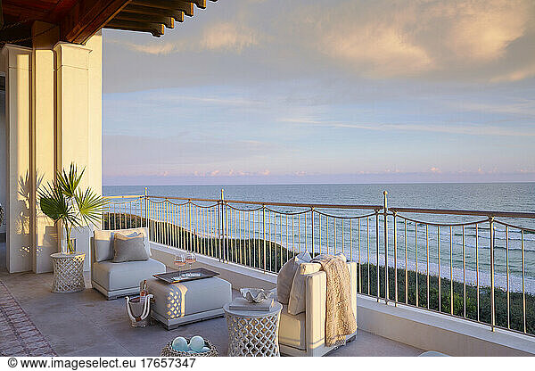 Porch with Gulf front view at sunset