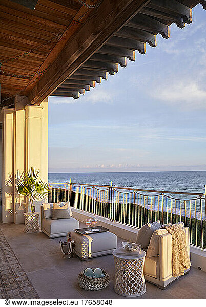 Porch with waterfront view at sunset