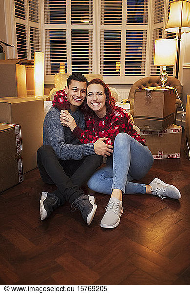 Portrait happy  affectionate couple moving house