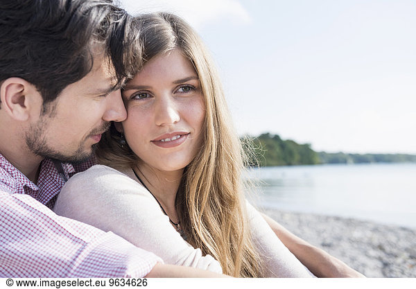 Portrait loving young couple lake romantic