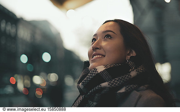 portrait of a beautiful young woman in a street in wintertime
