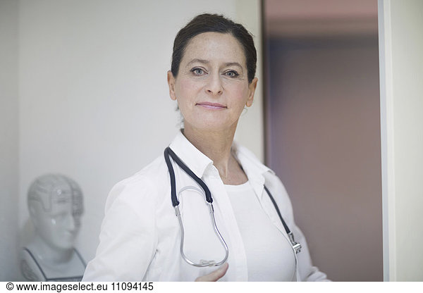 Portrait of a confident female doctor with stethoscope