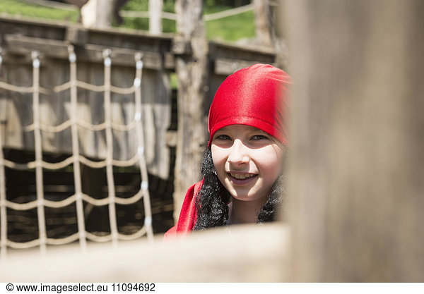 Portrait of a girl smiling in playground  Bavaria  Germany
