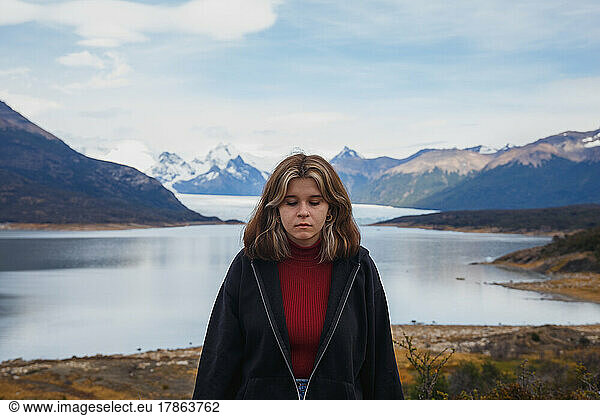 Portrait of a girl with closed eyes and a view of the lake Argentina