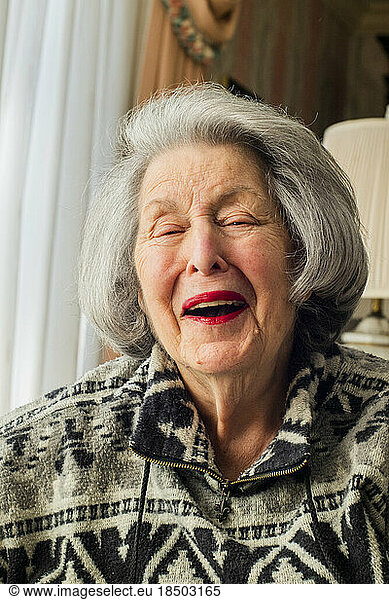 Portrait of a grandma laughing