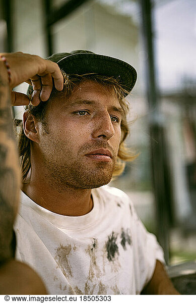 Portrait of a happy young man with freckles.