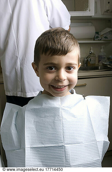 Portrait Of A Little Boy Smiling At The Dentist