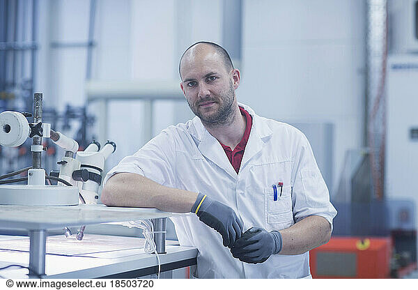 Portrait of a male engineer standing in industry  Hanover  Lower Saxony  Germany