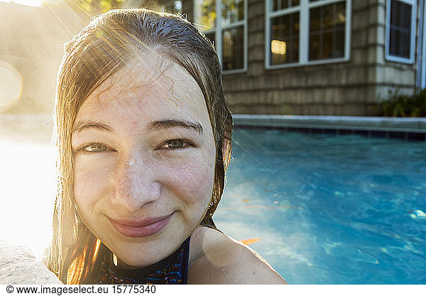 Portrait of a teenage girl in a swimming pool  head and shoulders
