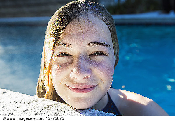 Portrait of a teenage girl in a swimming pool  head and shoulders