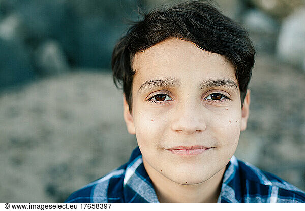 Portrait Of A Tween Boy With Brown Eyes