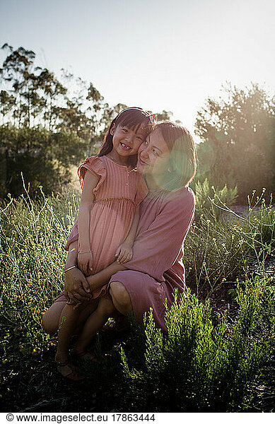 Portrait of Asian Mother & Daughter at Sunset in Park in San Diego