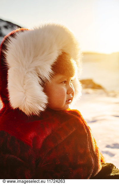 Portrait of baby boy (18-23 months) in winter coat