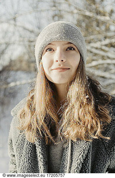 Portrait of beautiful teenage girl wearing knit hat