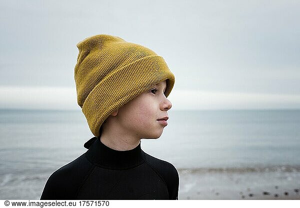 portrait of boy getting ready for cold water swimming