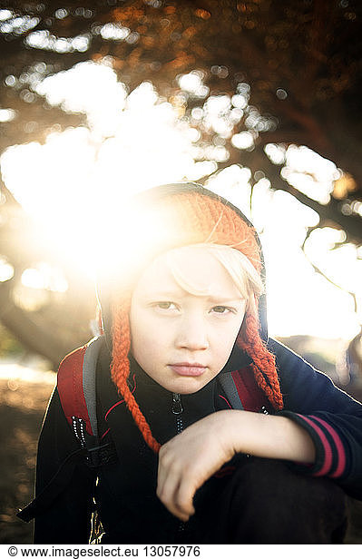 Portrait of boy in warm clothing on sunny day