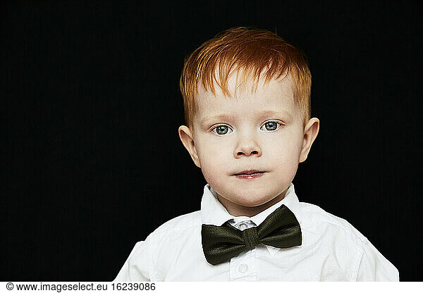Portrait of boy wearing bow tie