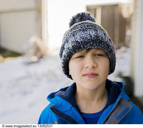 Portrait of boy wearing warm clothing during winter