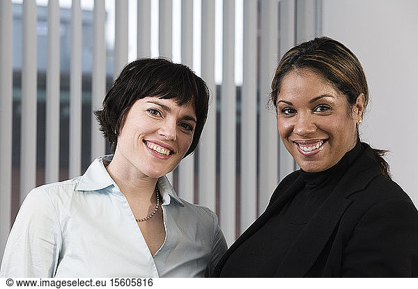 Portrait of business women smiling.