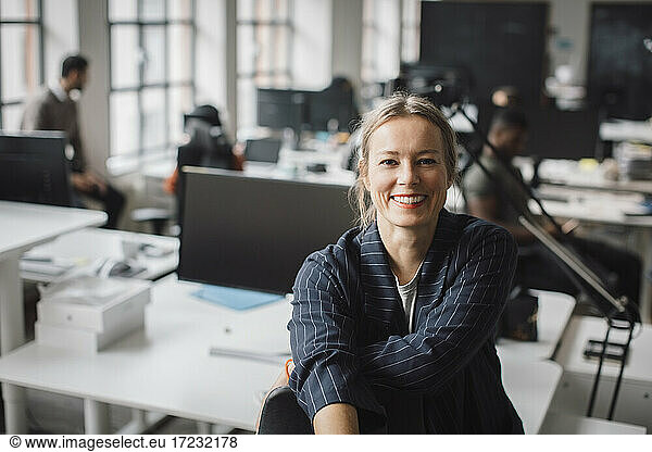 Portrait of businesswoman smiling at office