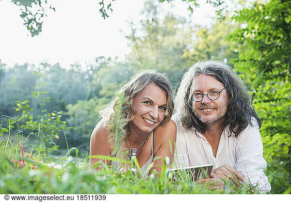 Portrait of cheerful couple in nature